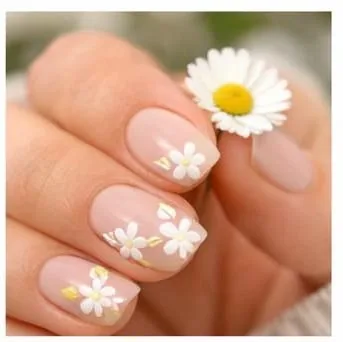 Floral pastel nail art with small white daisy designs