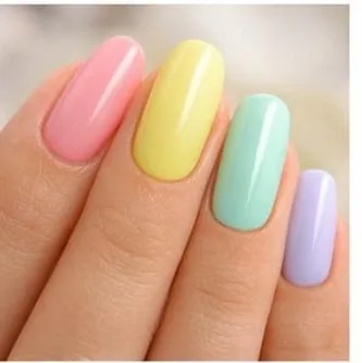 Rainbow pastel nails with pink, yellow, mint and lavender